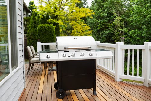 Large BBQ Grill on Wooden Deck